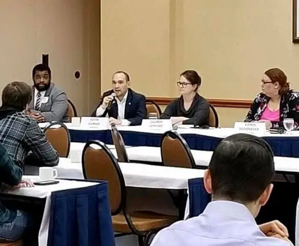 Kevin speaks on a panel